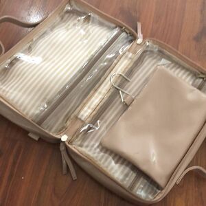 New Nude patent leather cosmetic carrying bag. “Hello Lovely” embroidered